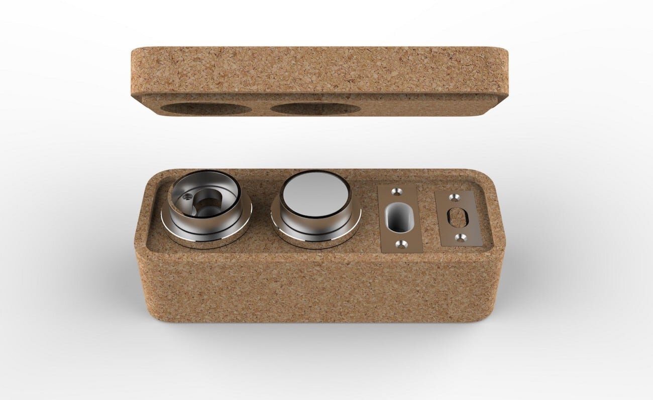 Render of a cork box with its lid lifted, holding the lock's parts in fitted pockets