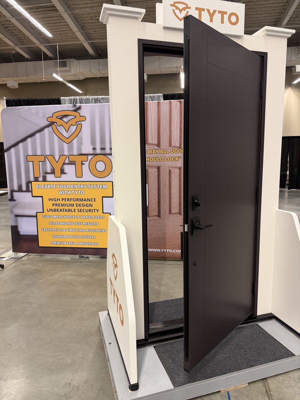 A display door fitted with Tyto at a trade show booth